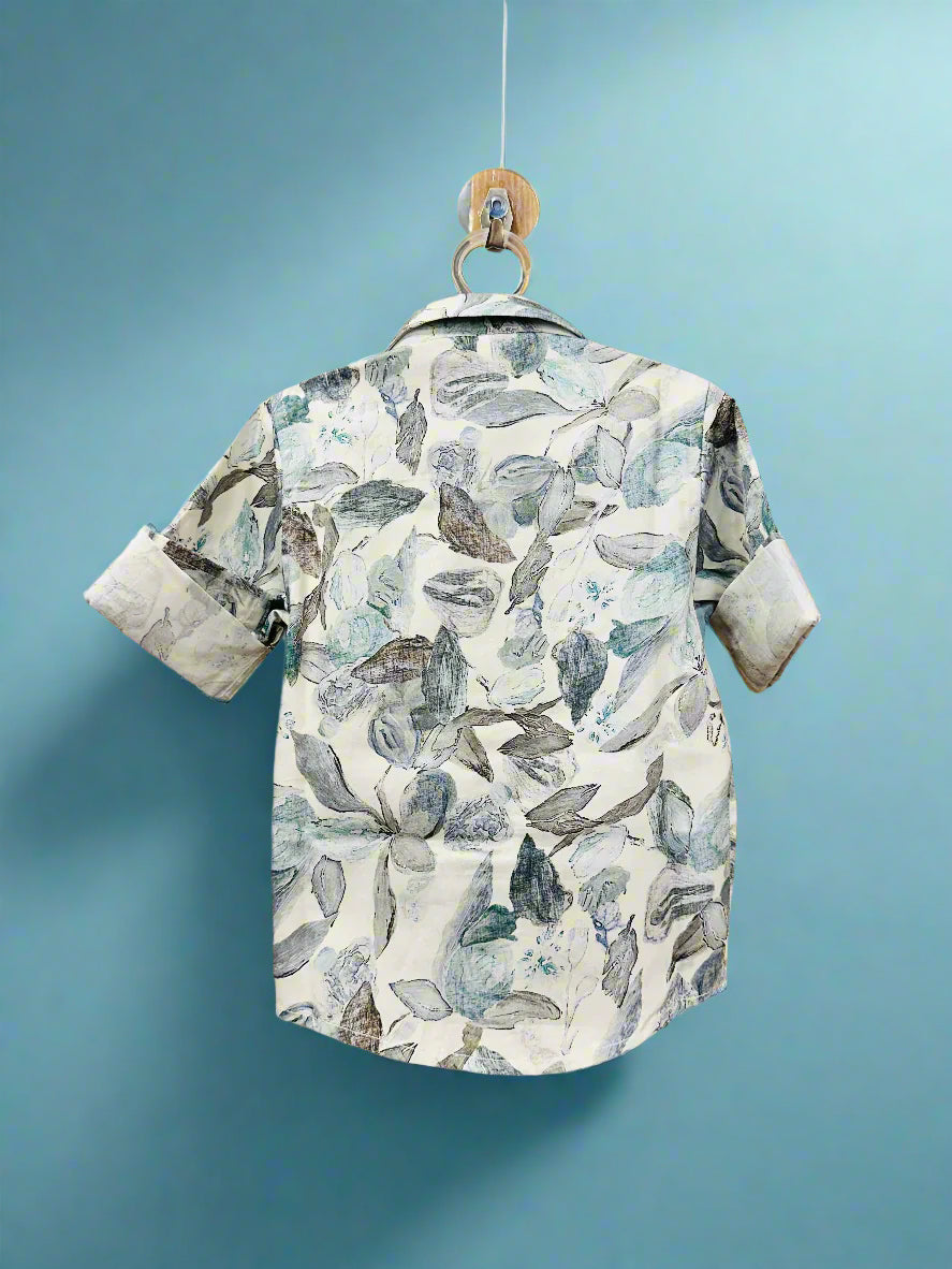 Luxe Thread boys summer shirt floral design featuring a light fabric and rolled sleeves