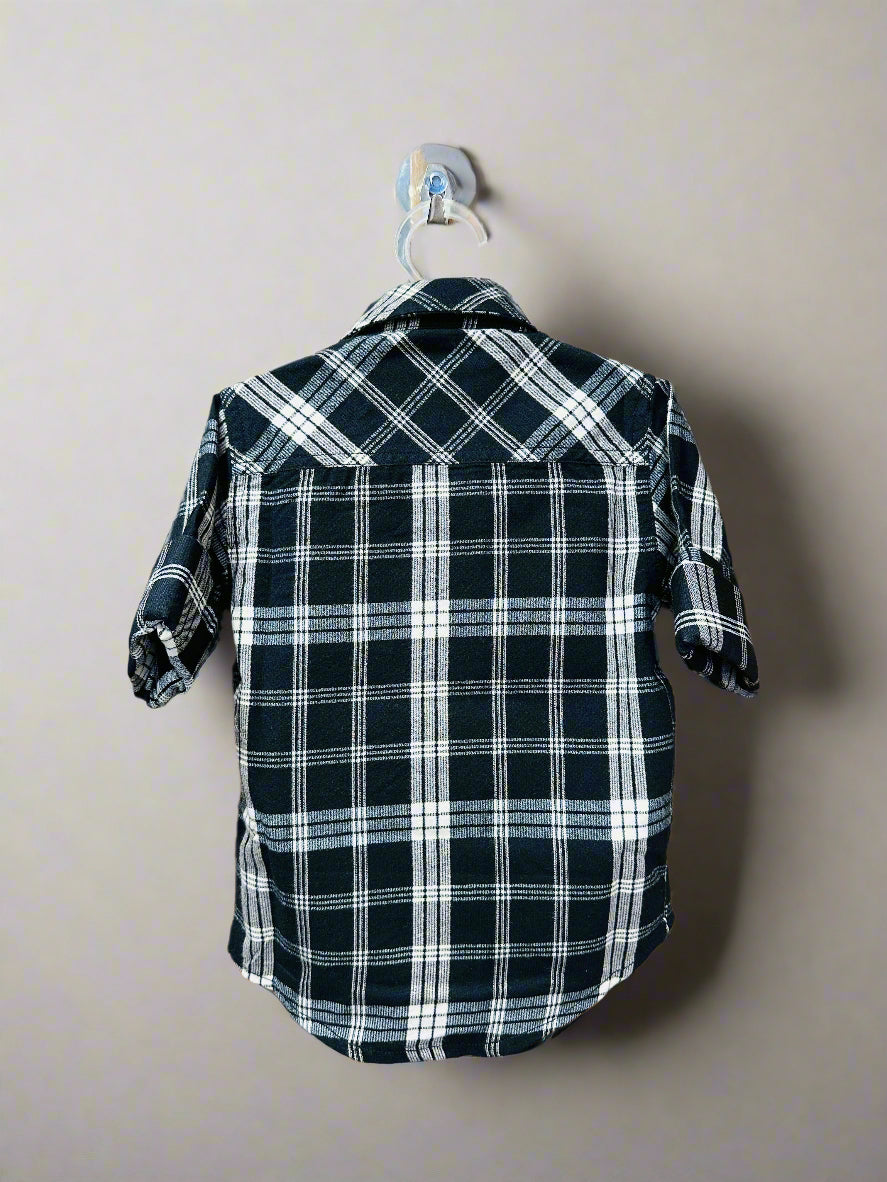Back view of Luxe Thread kids checkered button down shirt in black and white plaid design