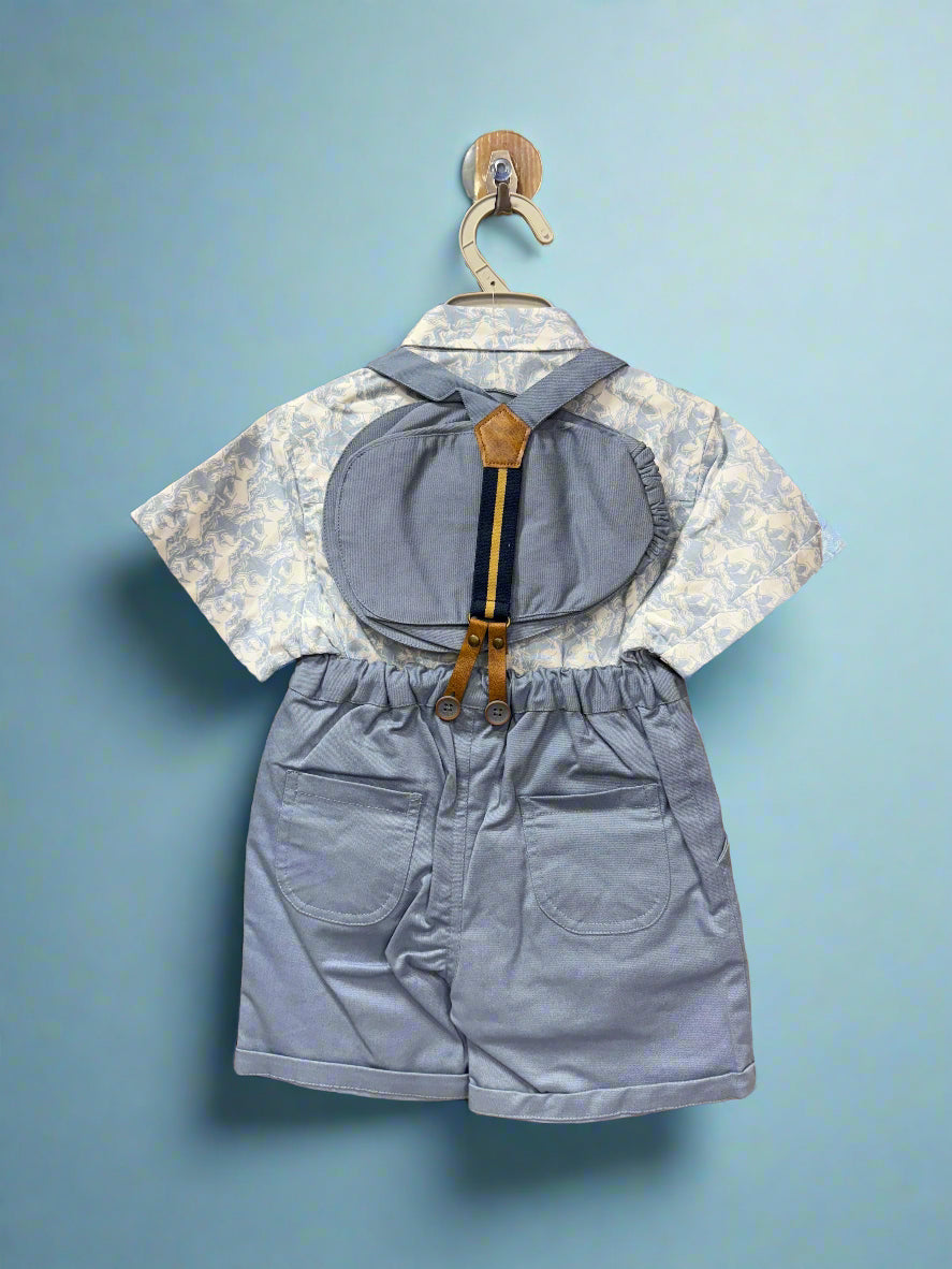 Toddler blue shorts set with bow tie featuring a floral shirt and adjustable suspenders