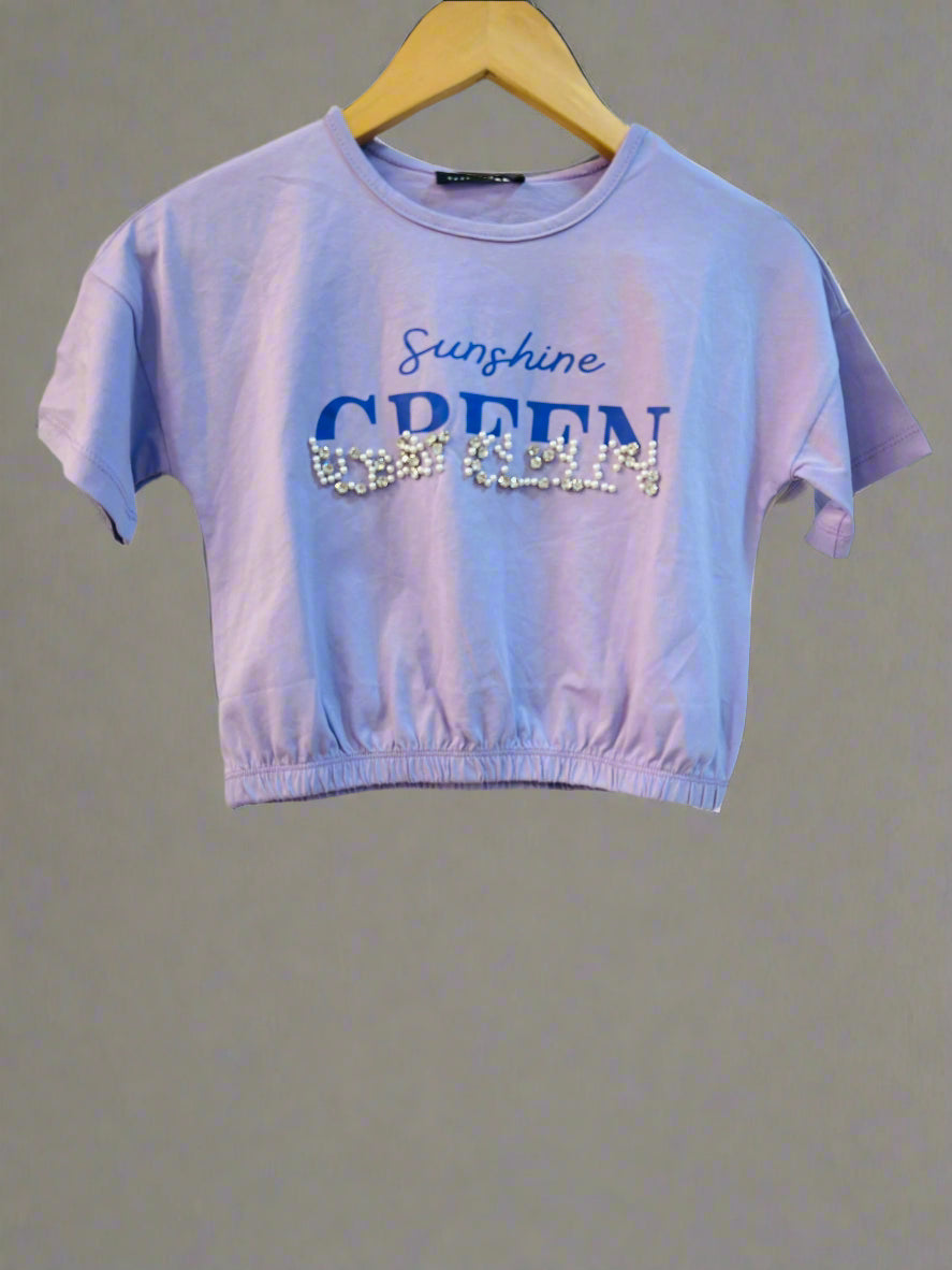 Luxe Thread cute kids crop top in light purple with glittery green text and elastic hem