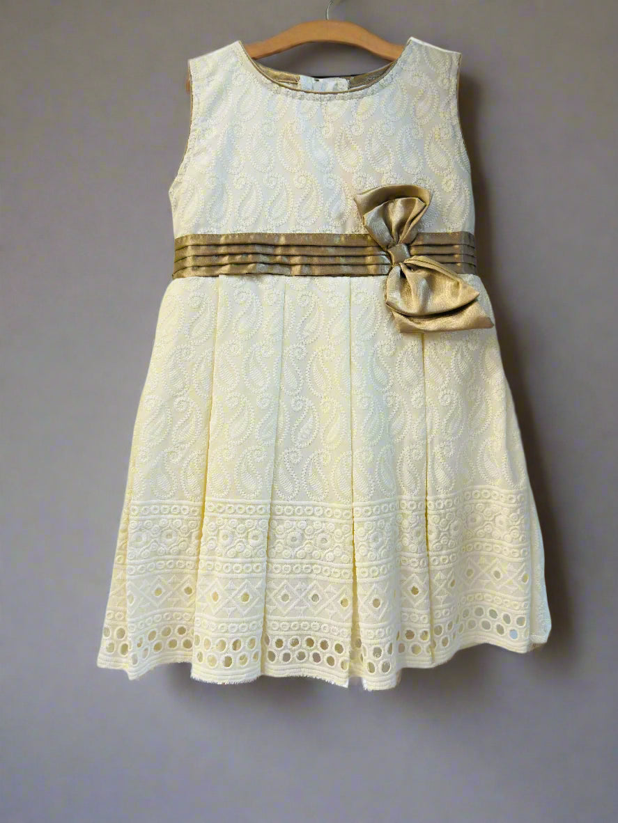 Luxe thread gold embroidered party frock with a stylish ribbon for special occasions